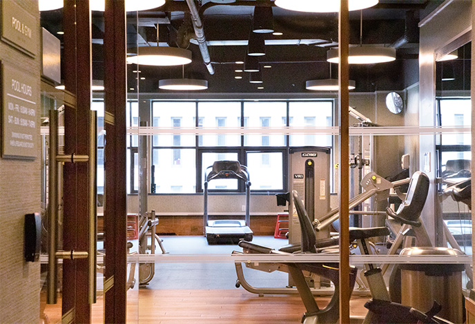 treadmill and weight machines in the South Park Tower fitness center
